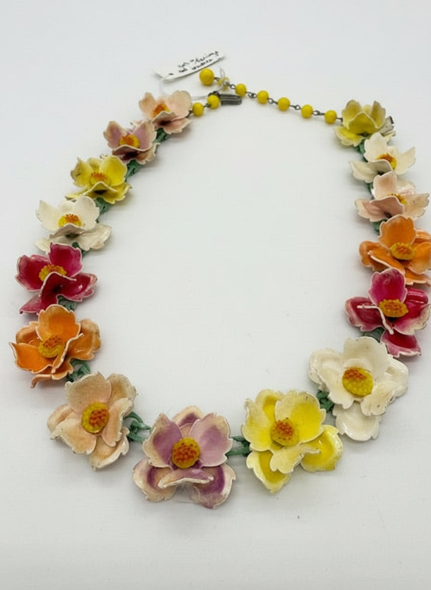 Floral necklace with colorful flowers on a white background